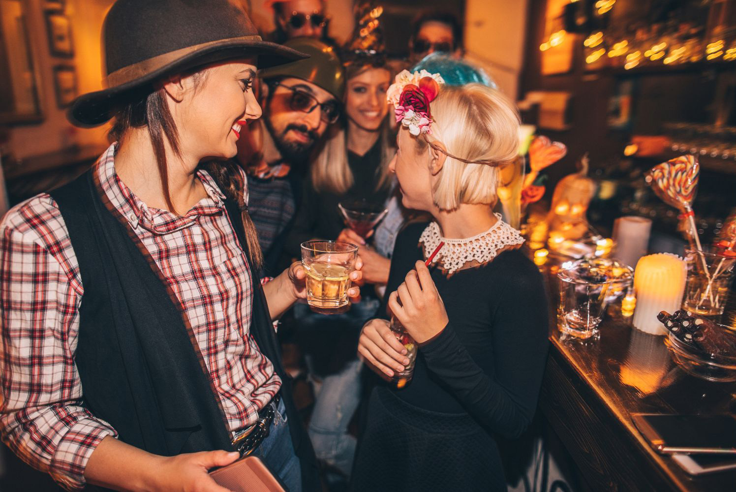 A group of friends having fun at a Halloween party having drinks | Bala Bay Inn